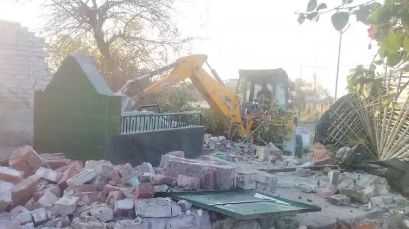 Dhami government demolished illegal shrine with bulldozer, backed by police force